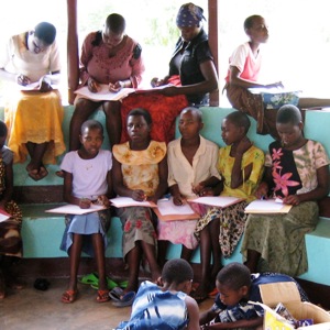 Group of girls under the pavilion at the Musoma office.