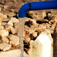 BluePump hand pump and water.
